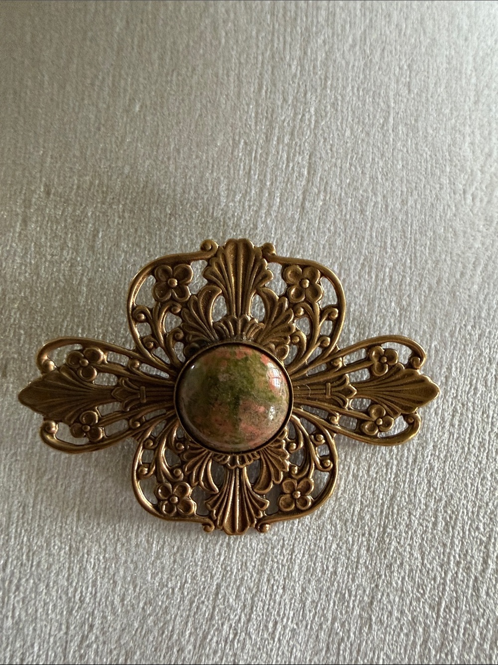 Antique-Style Bronze Filigree Brooch with Green-Pink Stone